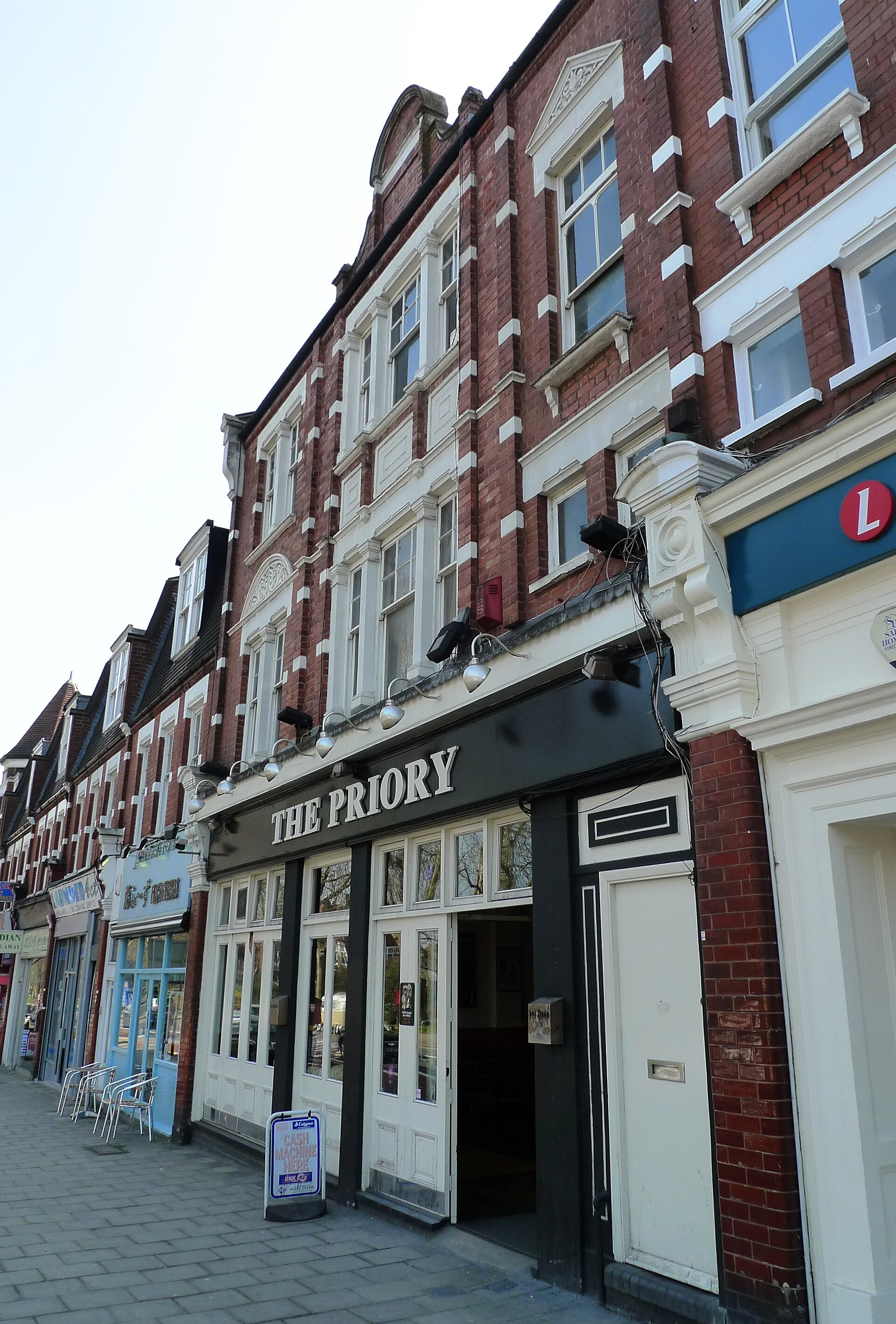 169 Priory Road, Hornsey, showing upper-floor flats above ground-floor premises on the street where the HMO application has been made.
